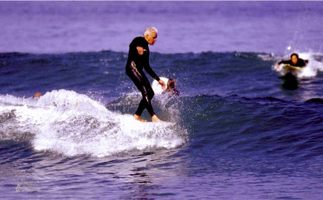 Rob Caughlan surfing